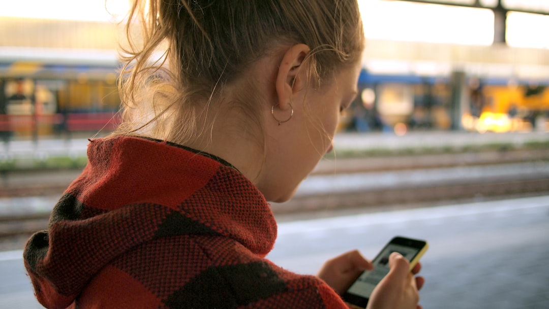 about-us Checking Her Smartphone